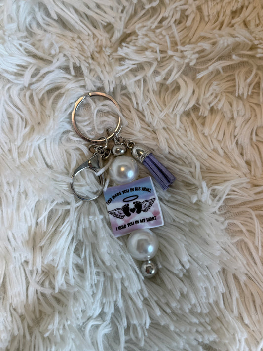 God holds you in His arms, I hold you in my heart keychain
