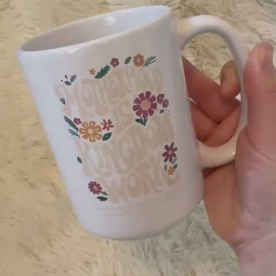 Motherhood is kingdom work glass mug